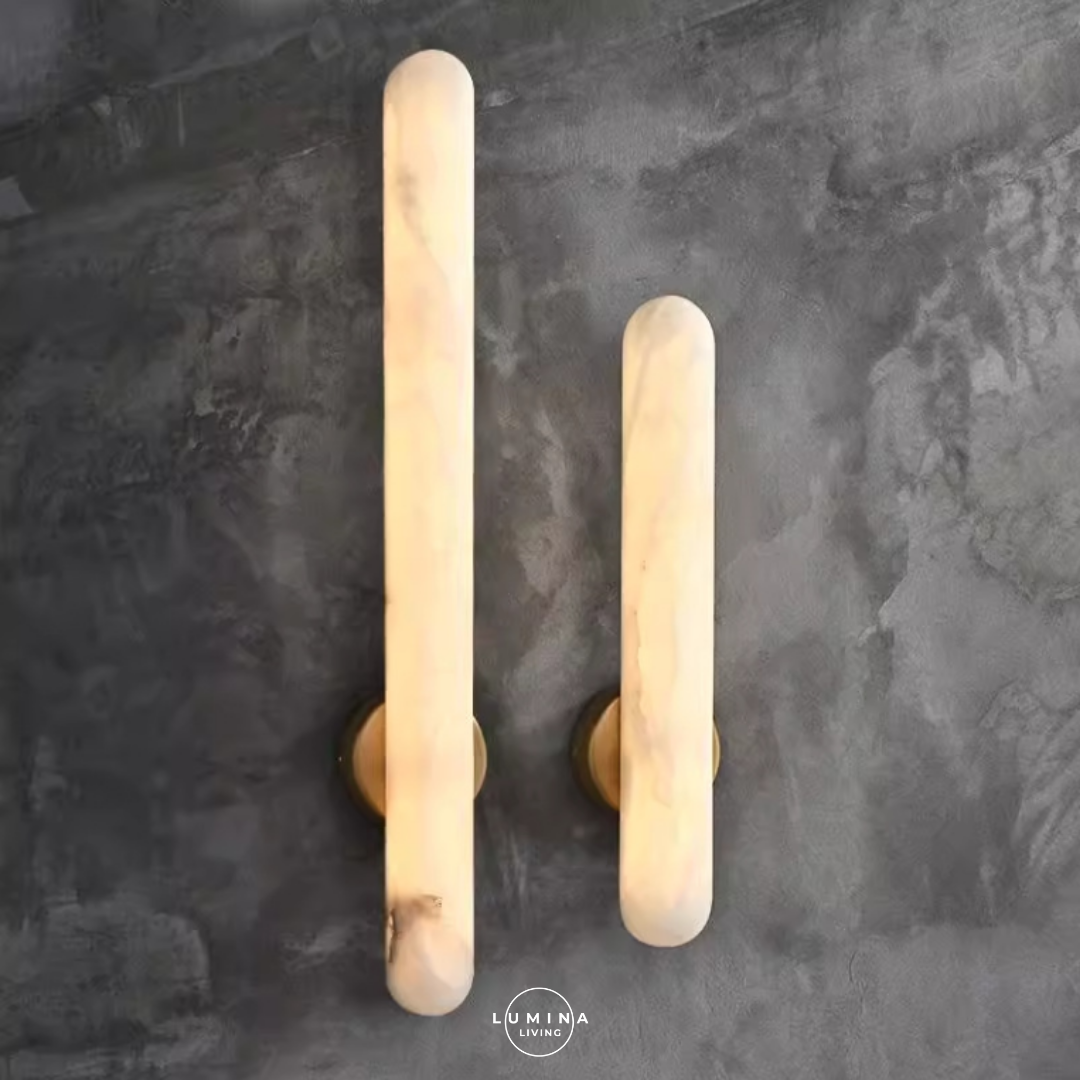 Two wall sconces with a warm glow on a dark textured wall, featuring the Lumina Living logo. Singapore's top online destination for stylish and high-quality lighting solutions. Whether you’re looking to transform your home with elegant pendant lights, modern chandeliers, or energy-efficient LED lights, we have an extensive selection to suit every taste and budget.