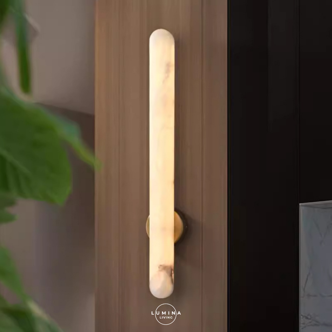 Wall-mounted light fixture on a wooden wall with 'Lumina Living' branding. Singapore's top online destination for stylish and high-quality lighting solutions. Whether you’re looking to transform your home with elegant pendant lights, modern chandeliers, or energy-efficient LED lights, we have an extensive selection to suit every taste and budget.