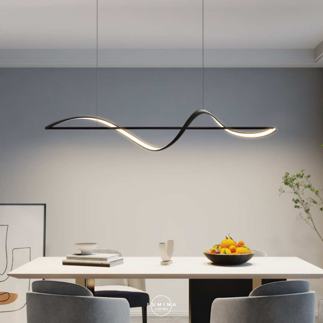 Modern dining room with a wavy pendant light fixture. Singapore's top online destination for stylish and high-quality lighting solutions. Whether you’re looking to transform your home with elegant pendant lights, modern chandeliers, or energy-efficient LED lights, we have an extensive selection to suit every taste and budget.