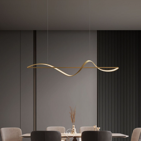 Modern gold pendant light hanging above a dining table with chairs in a minimalistic setting. Singapore's top online destination for stylish and high-quality lighting solutions. Whether you’re looking to transform your home with elegant pendant lights, modern chandeliers, or energy-efficient LED lights, we have an extensive selection to suit every taste and budget.