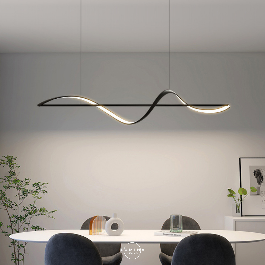 Modern pendant light hanging above a dining table in a room with a neutral color scheme. Singapore's top online destination for stylish and high-quality lighting solutions. Whether you’re looking to transform your home with elegant pendant lights, modern chandeliers, or energy-efficient LED lights, we have an extensive selection to suit every taste and budget.